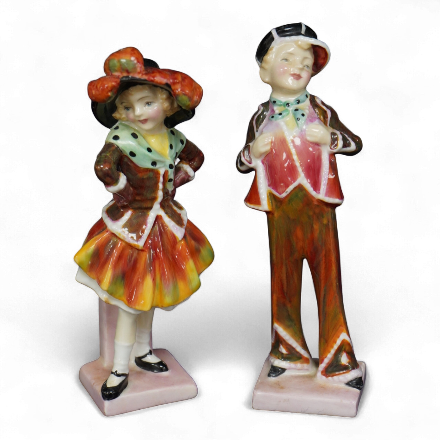 A pair of Royal Doulton figures, Pearly Boy, HN2055, and Pearly Girl, HN2036, 15cm high